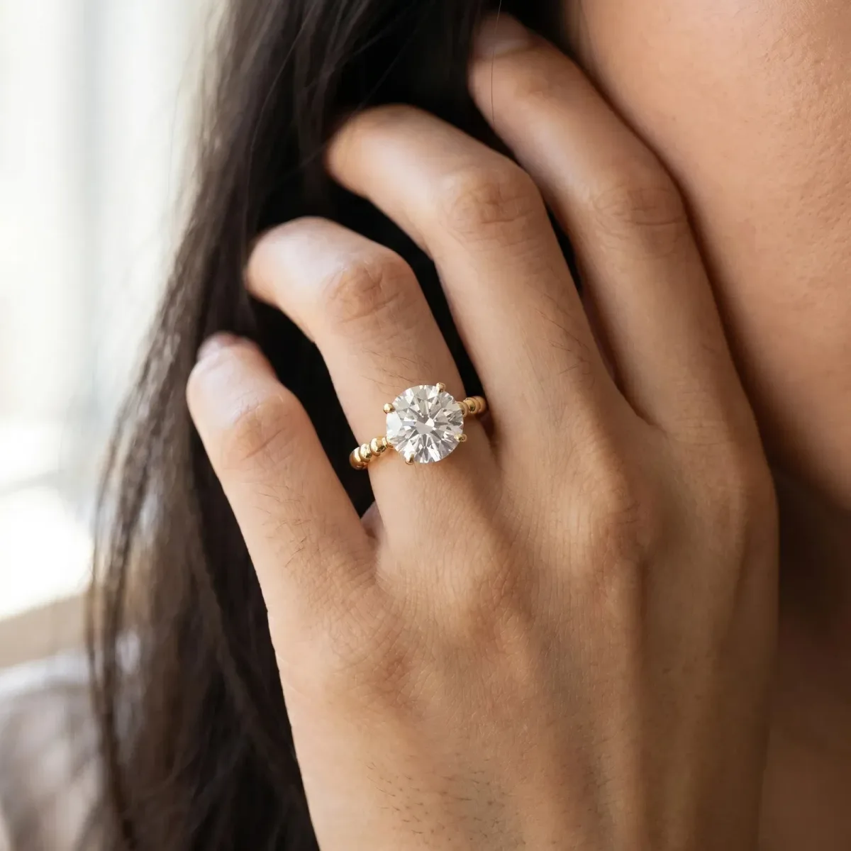 Round Cut Diamond Solitaire Ring with Beaded Band and Prong Setting Yellow gold