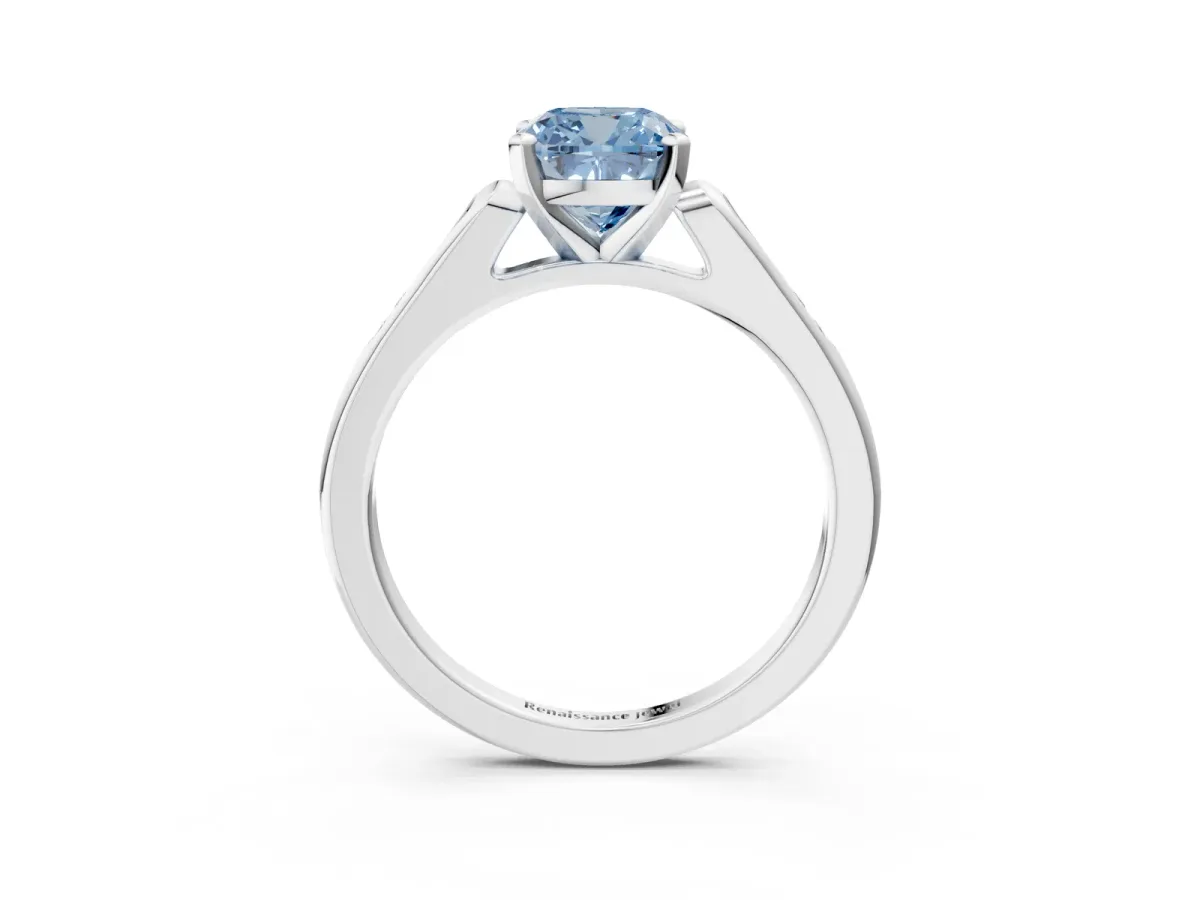Fancy Blue Cushion Cut Diamond Solitaire Ring with Channel Set Round Band and Prong Setting Silver