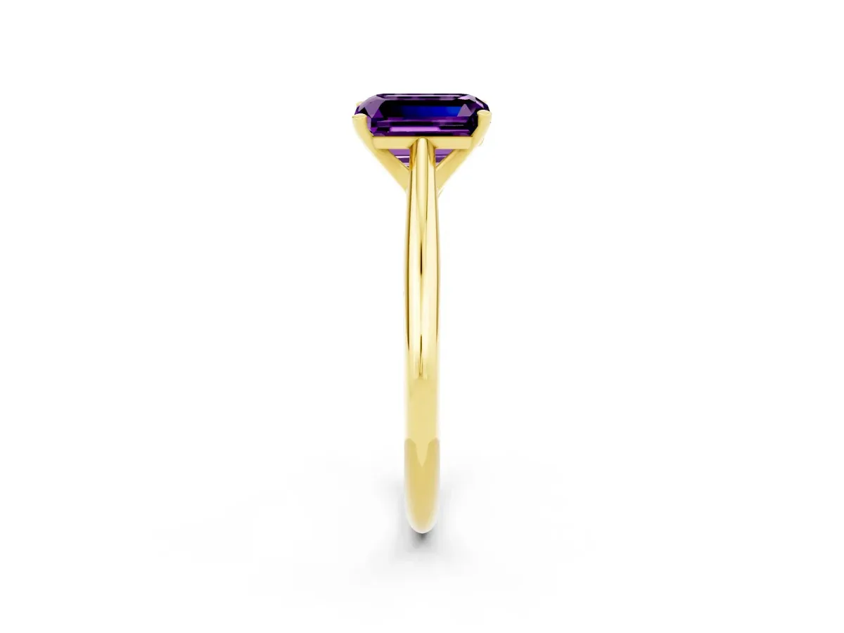 Emerald Cut Amethyst Solitaire Engagement Ring with Cathedral Setting and Four-Prong Mount Yellow gold