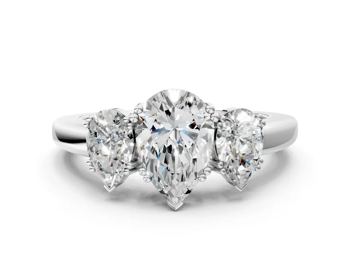 Three-Stone Pear Cut Cut Diamond Ring with Channel Set Band and Four-Prong Setting White gold