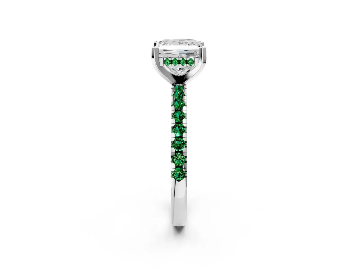 Princess Cut Diamond Solitaire Ring with Round Emerald Pavé Band and Four-Prong Setting Silver
