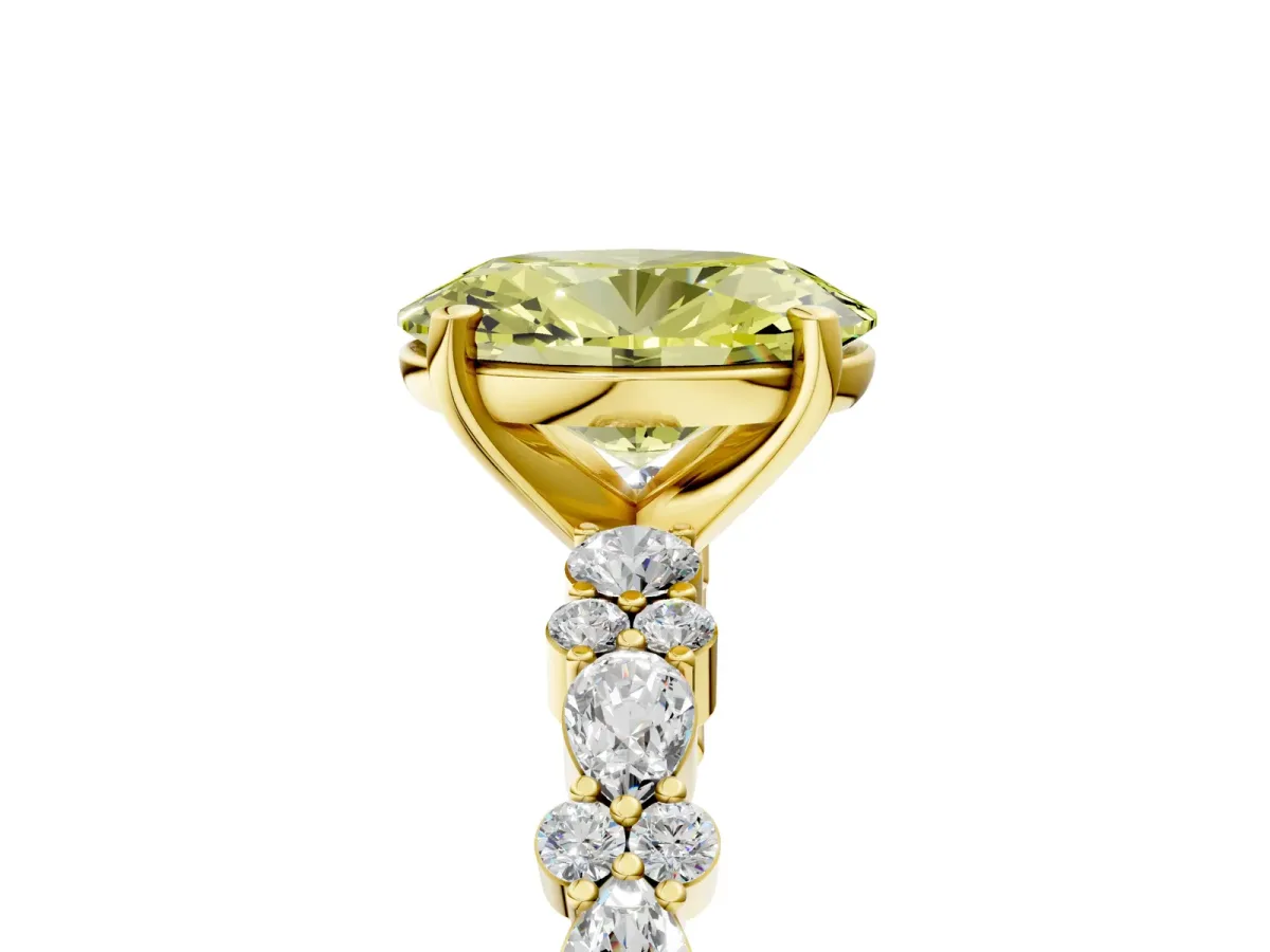 Fancy Yellow Oval Cut Diamond Side Stone Solitaire Ring with Round and Four-Prong Setting Yellow gold