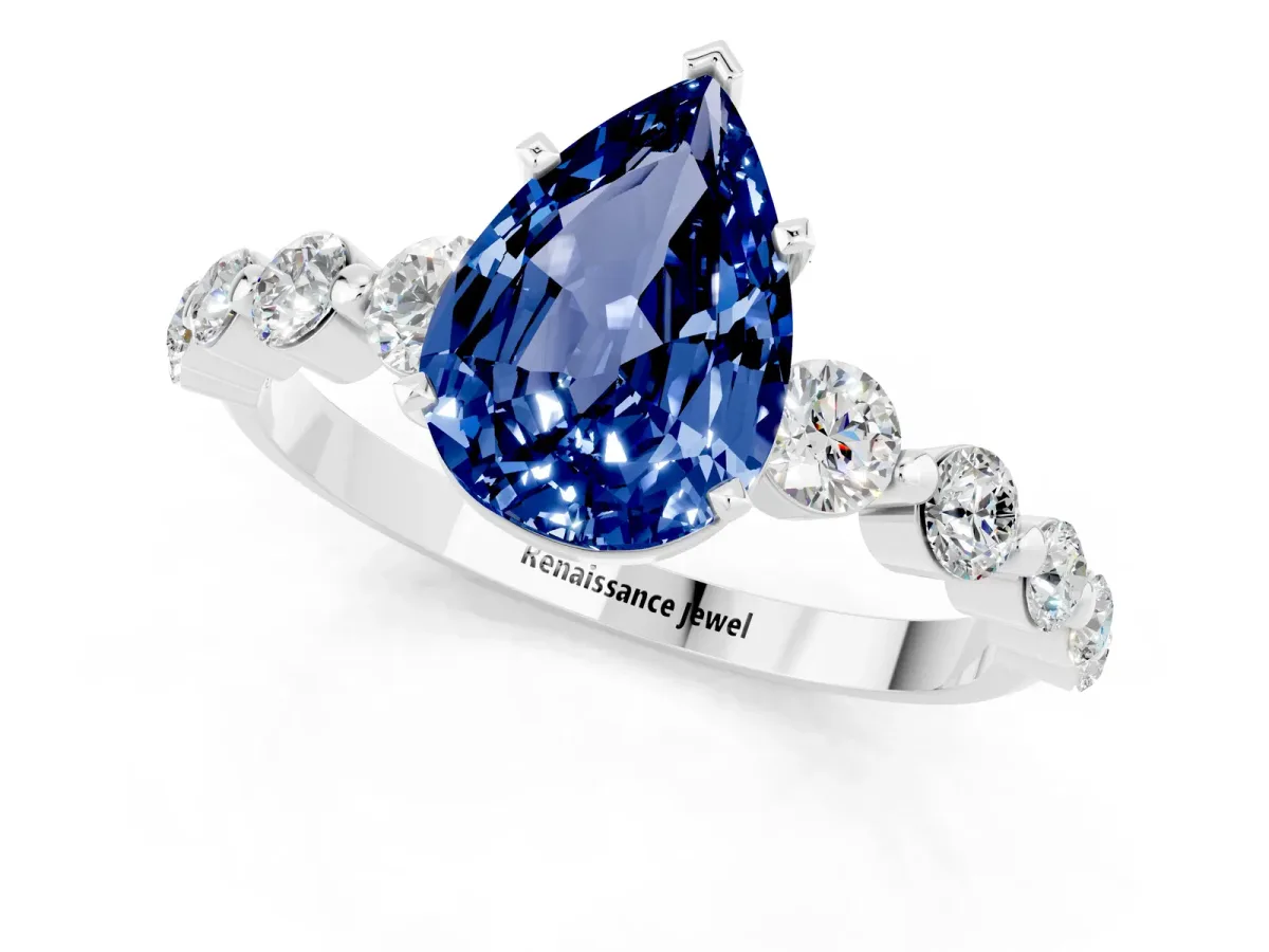 Pear Cut Solitaire Blue Sapphire Ring with Pave Band and Four-Prong Setting Platinum
