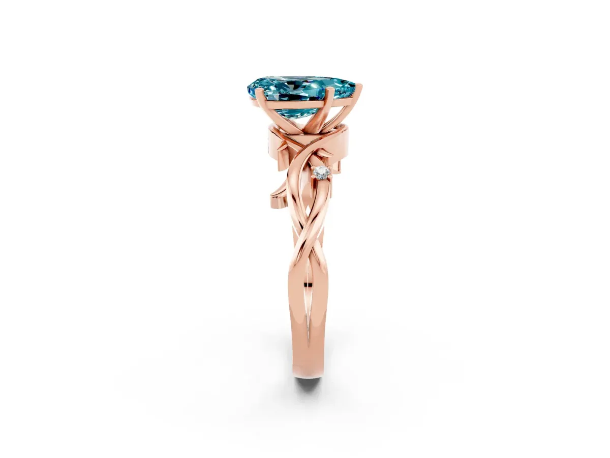 Pear Cut Blue Topaz Solitaire Ring with Twisted Band and Prong Setting Rose gold