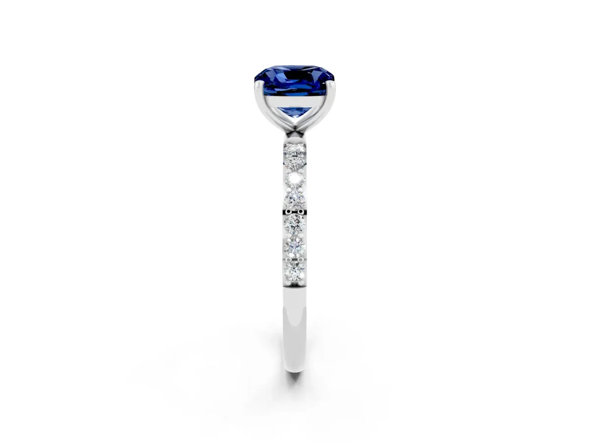 Cushion Cut Blue Sapphire Solitaire Ring with Round Pavé Band and Prong Setting Silver