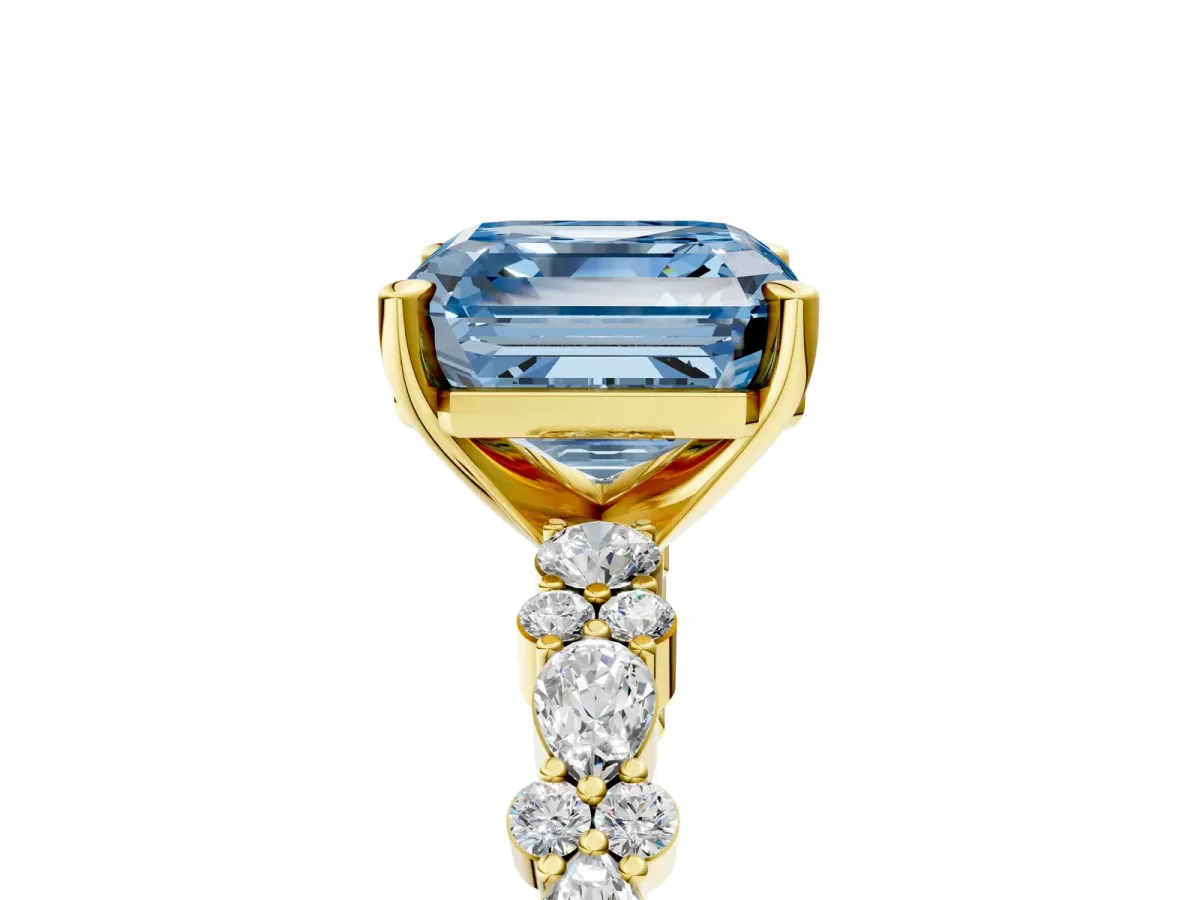 Fancy Blue Asscher Cut Diamond Side Stone Solitaire Ring with Round and Four-Prong Setting Yellow gold