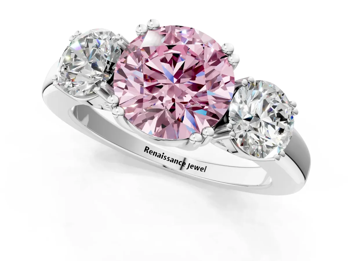 Fancy Pink Three-Stone Round Cut Cut Diamond Ring with Channel Set Band and Four-Prong Setting Silver