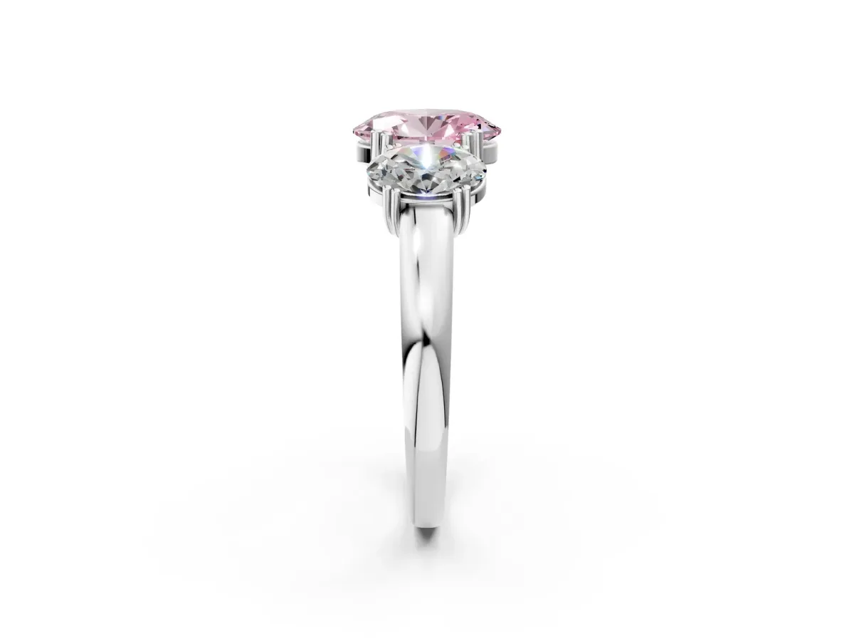 Fancy Pink Three-Stone Oval Cut Cut Diamond Ring with Channel Set Band and Four-Prong Setting Silver