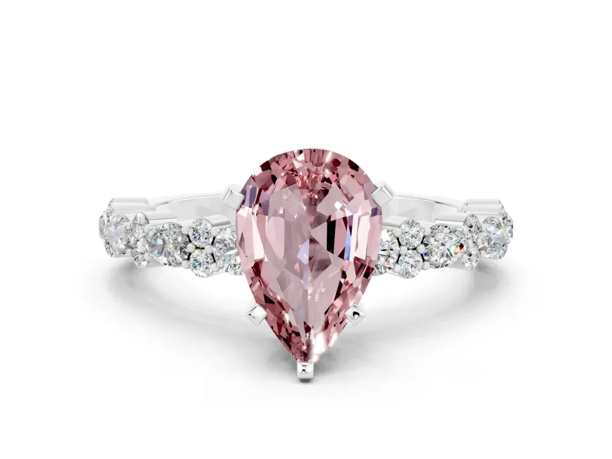 Pear Cut Morganite Side Stone Solitaire Ring with Round and Four-Prong Setting Platinum