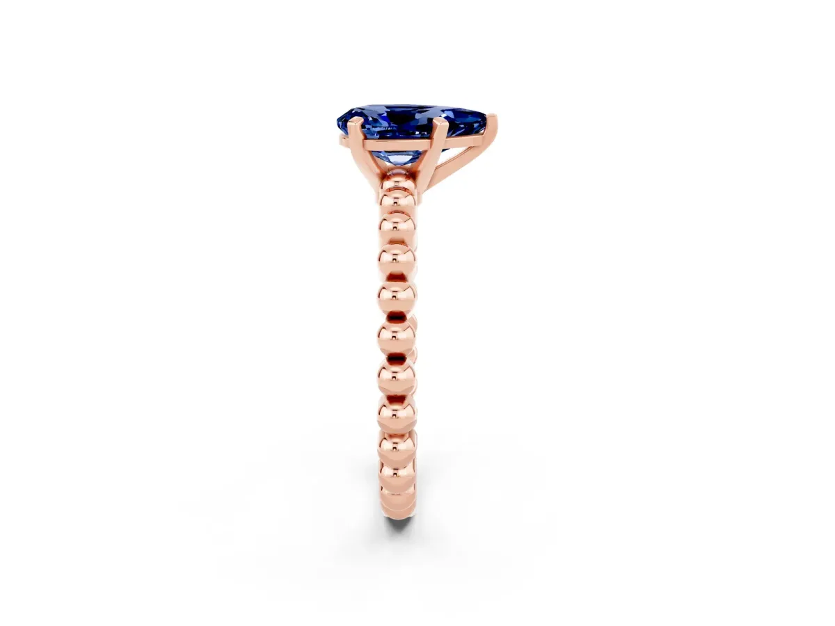 Pear Cut Blue Sapphire Solitaire Ring with Beaded Band and Prong Setting Rose gold