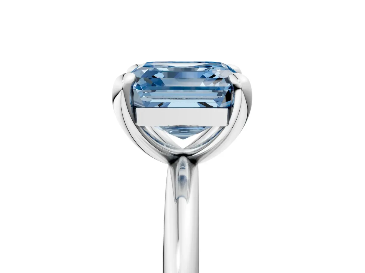 Fancy Blue Asscher Cut Solitaire Diamond Ring with Four-Prong Setting on a Plain Band Platinum