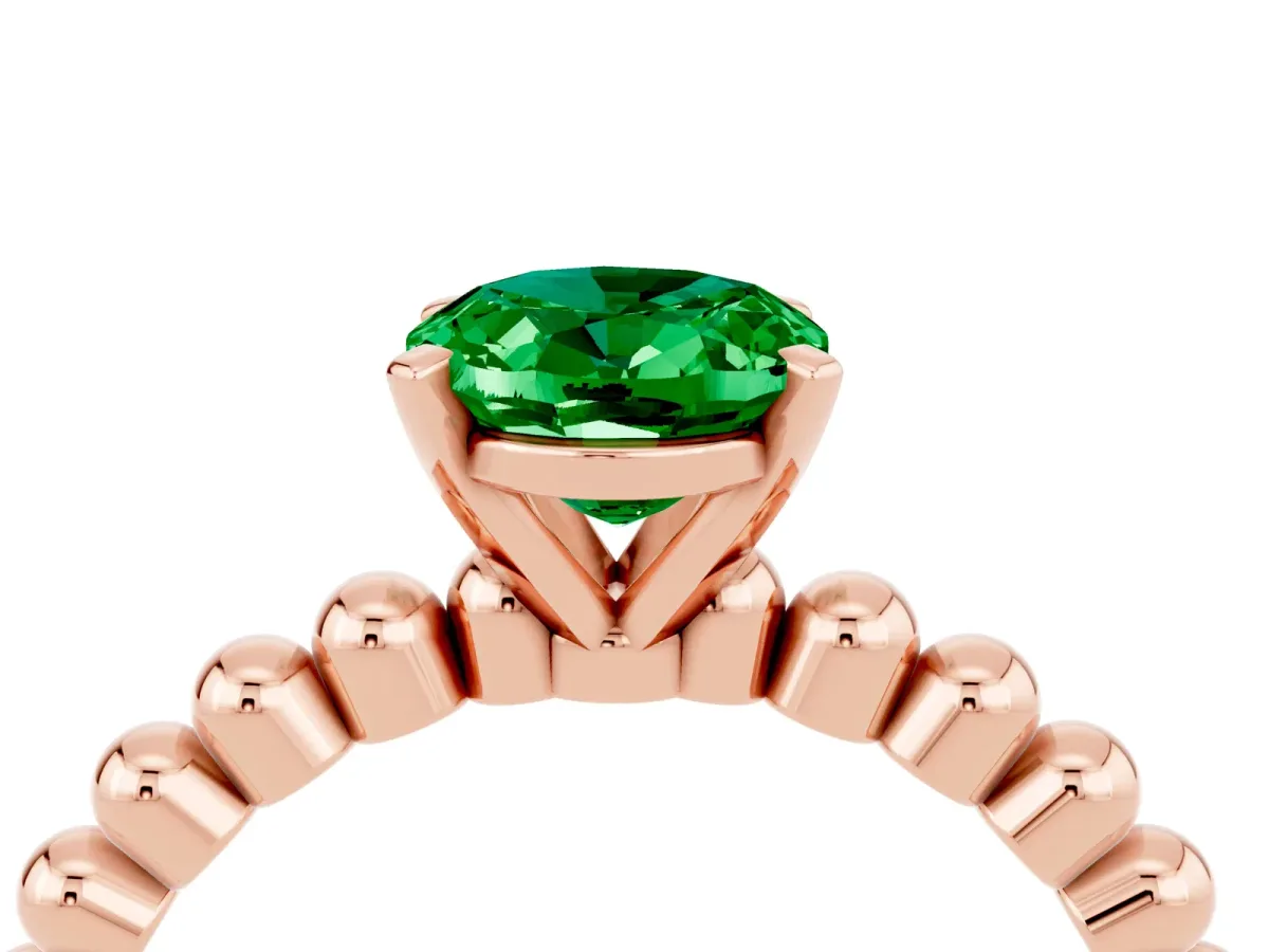 Oval Cut Emerald Solitaire Ring with Beaded Band and Prong Setting Rose gold