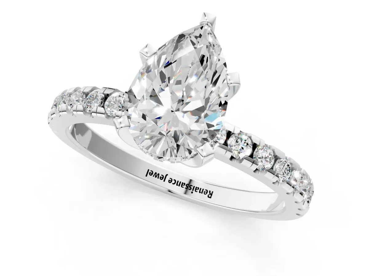 Pear Cut Diamond Solitaire Ring with Round Moissanite Pavé Band and Four-Prong Setting Silver