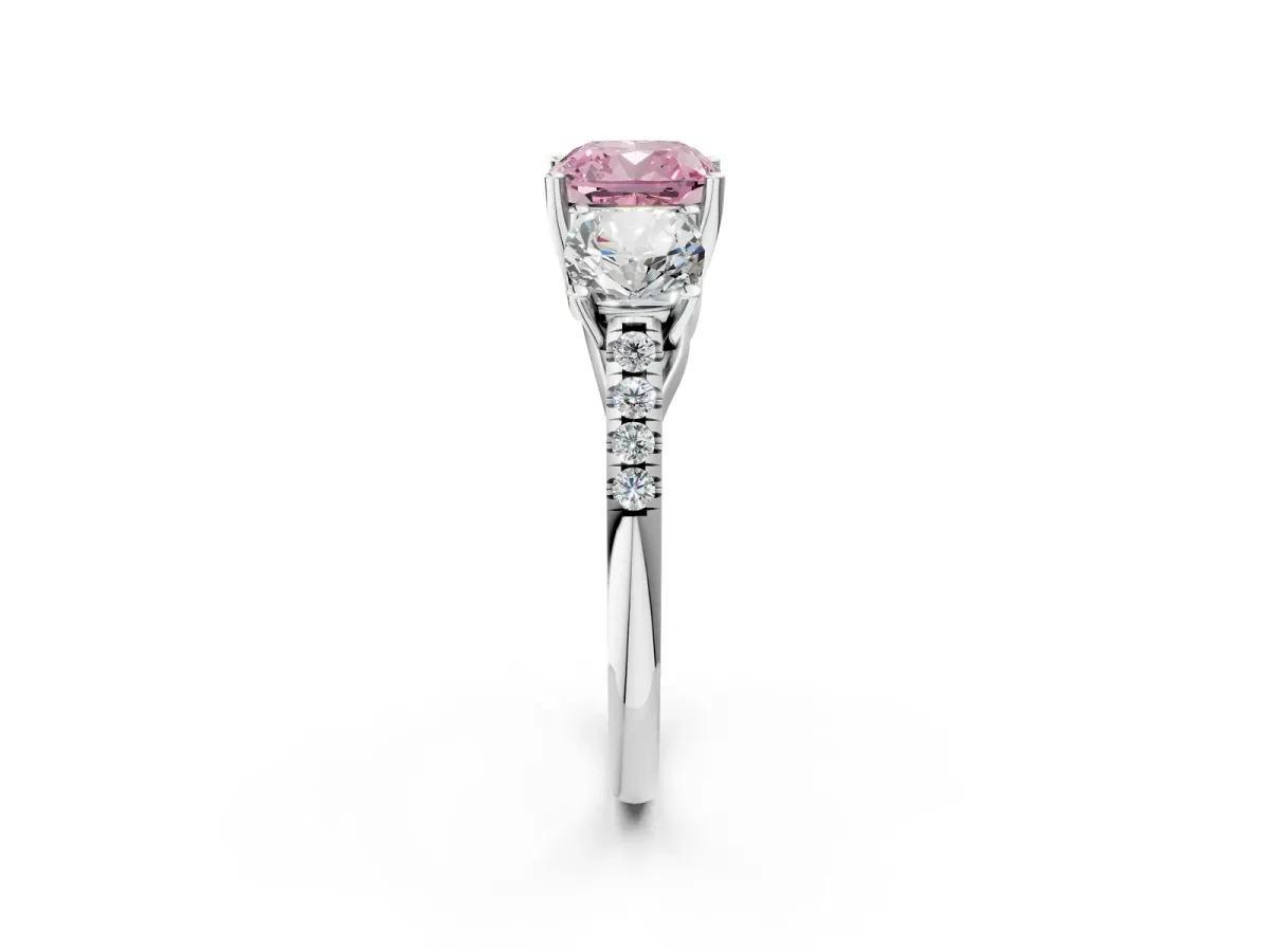 Fancy Pink Three-Stone Cushion Cut Diamond Ring with Round Pavé Band and Prong Setting Silver