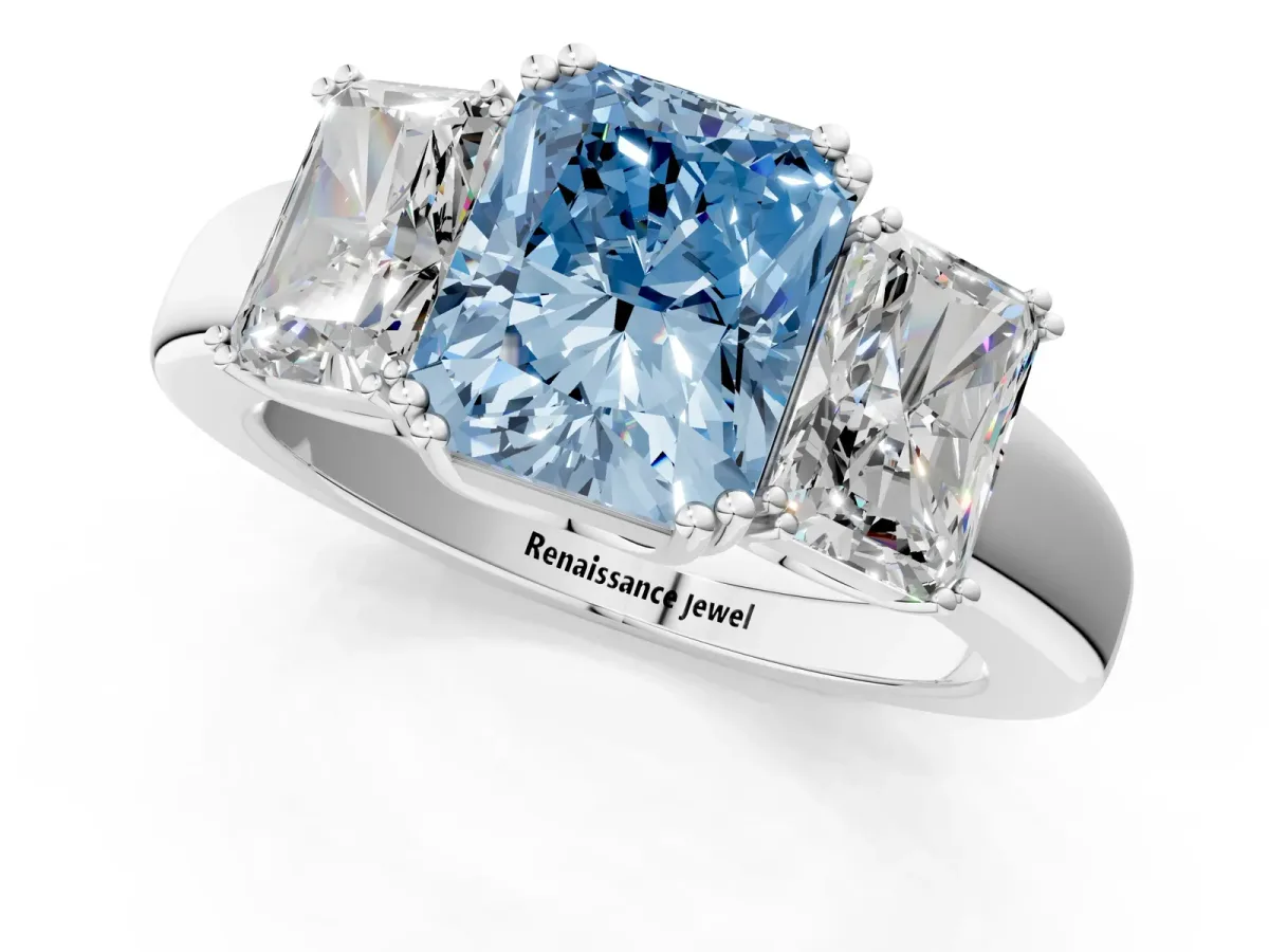 Fancy Blue Three-Stone Radiant Cut Cut Diamond Ring with Channel Set Band and Four-Prong Setting Silver