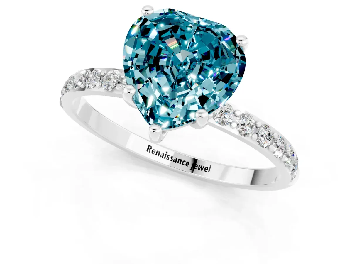 Heart Cut Blue Topaz Solitaire Ring with Round Pavé Band and Prong Setting Silver