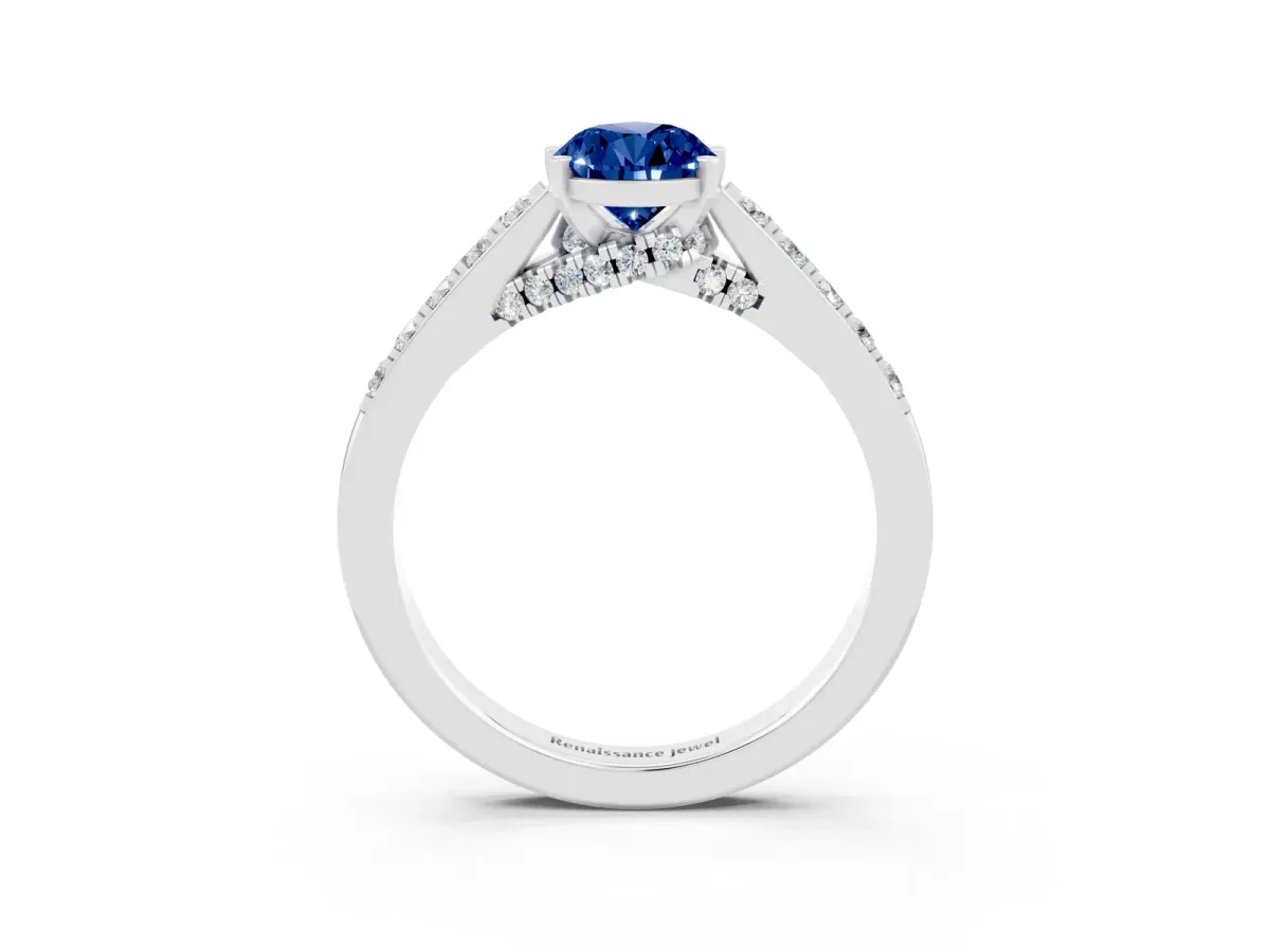 Pear Cut Blue Sapphire Solitaire Ring with Crossover Gallery and Round Pavé Band Silver