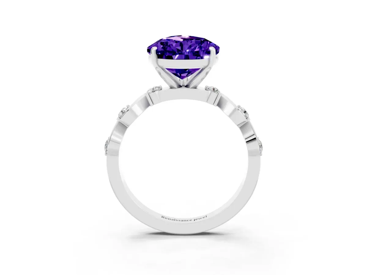 Pear Cut Tanzanite Solitaire Twisted Band with Round Accents and Prong Setting Silver