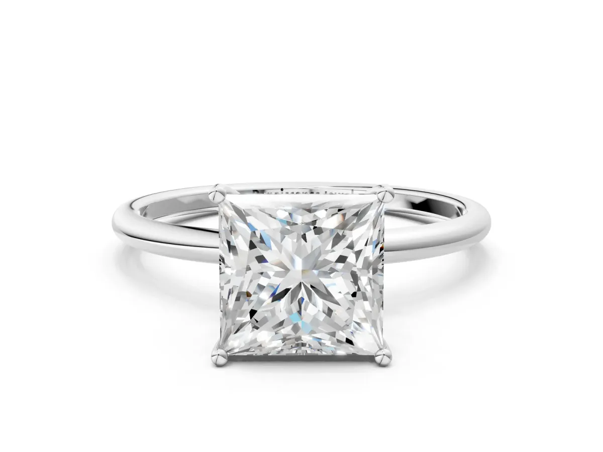 Princess Cut Cut Solitaire Engagement Ring with Thin Band and Four-Prong Setting Silver