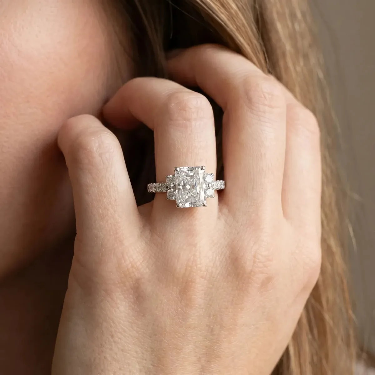 Radiant Cut Diamond Three-Stone Pave Band with Four-Prong Setting Platinum