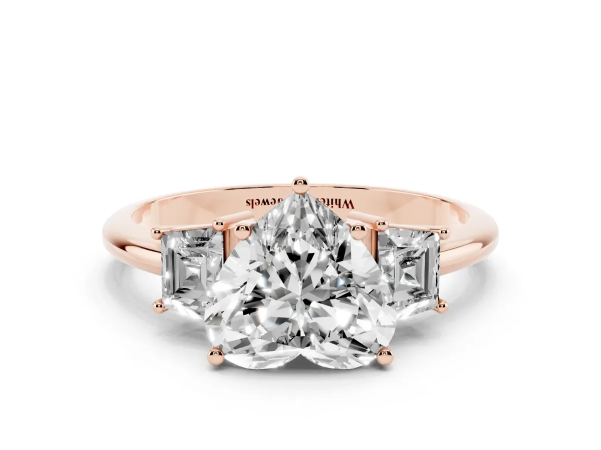 Heart Cut Diamond Three-Stone Ring with Trapezoid Side Stones and Prong Setting Rose gold