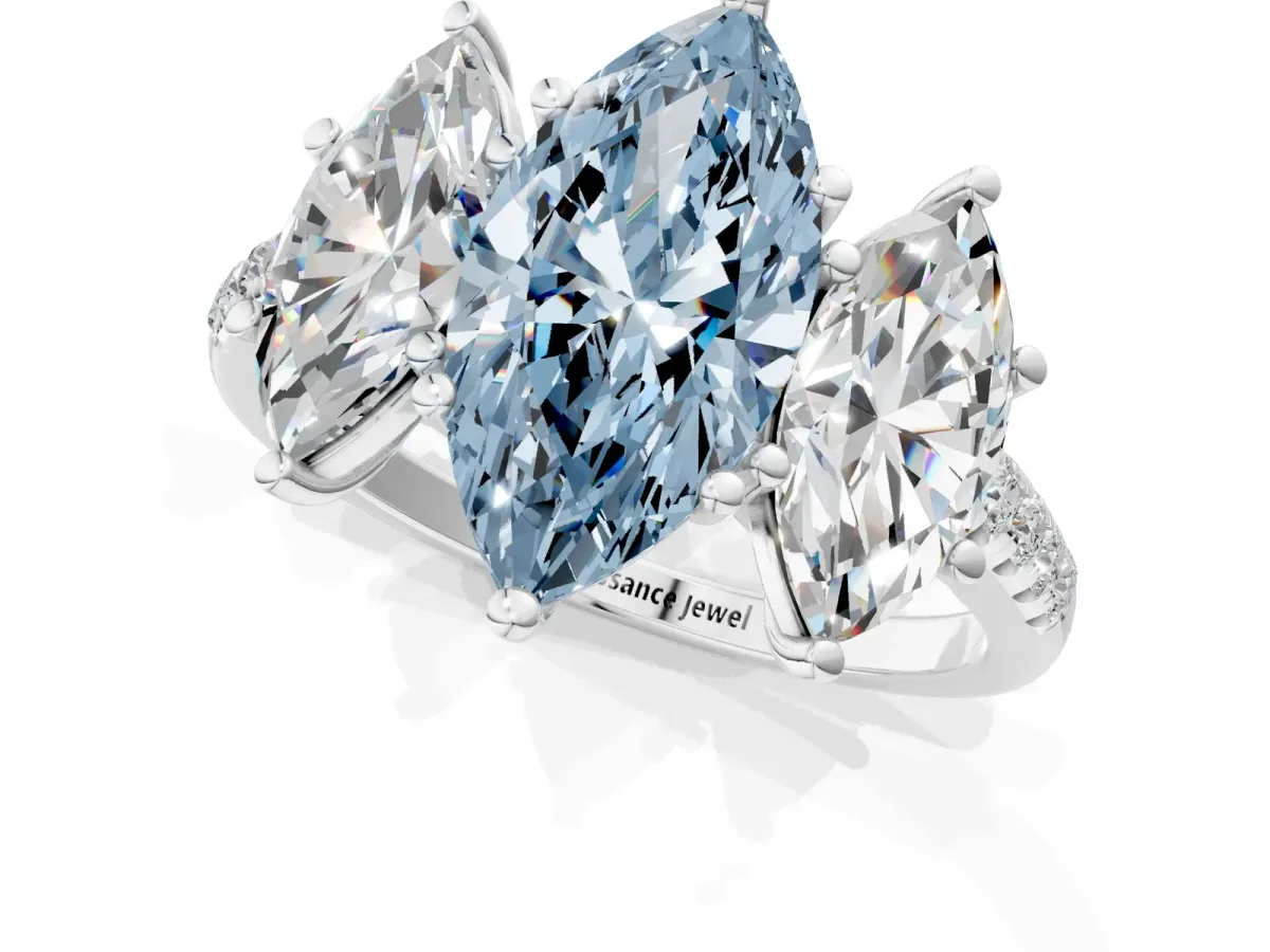 Fancy Blue Three-Stone Marquise Cut Diamond Ring with Round Pavé Band and Prong Setting Silver