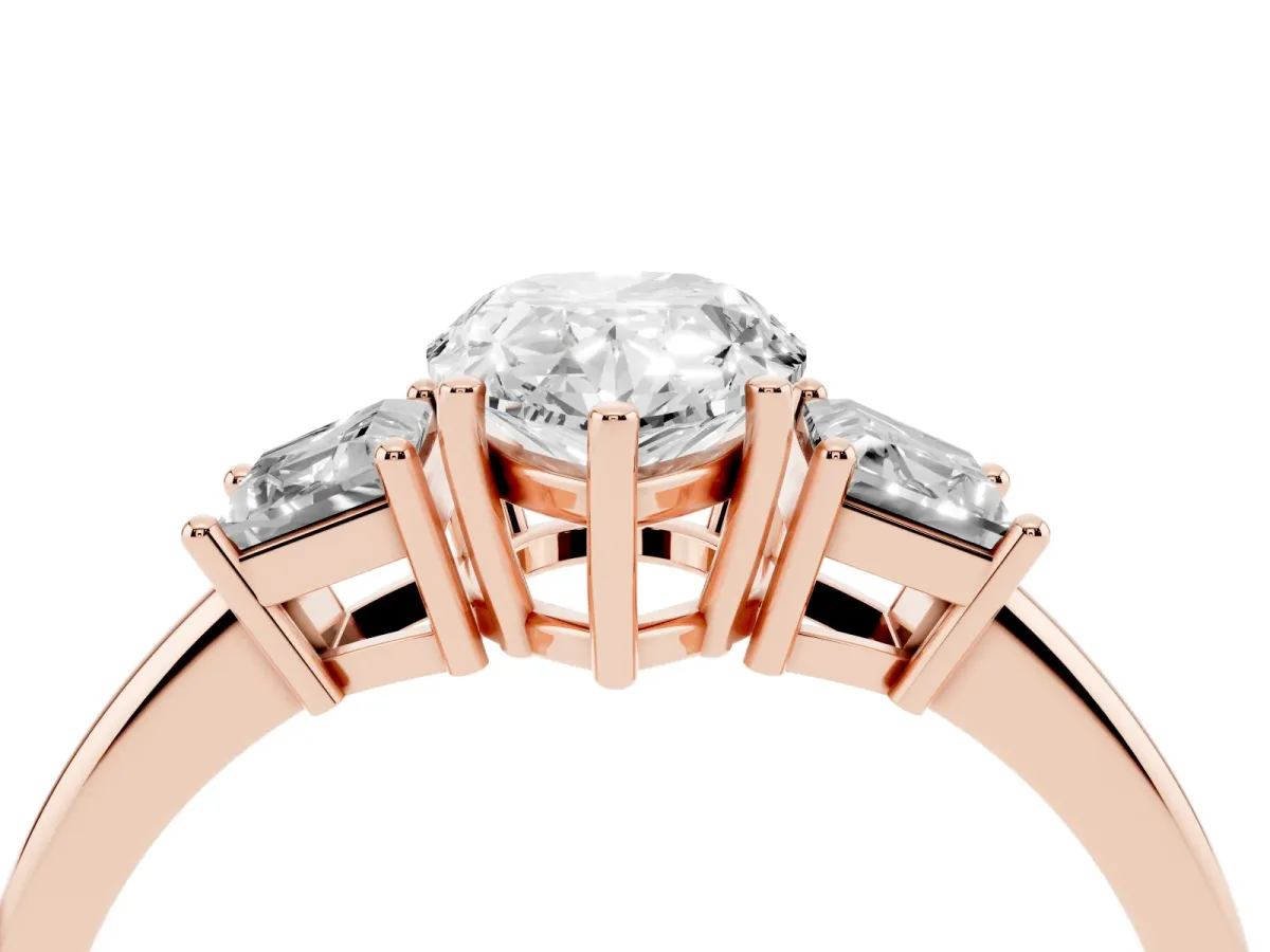 Pear Cut Diamond Three-Stone Ring with Trapezoid Side Stones and Prong Setting Rose gold