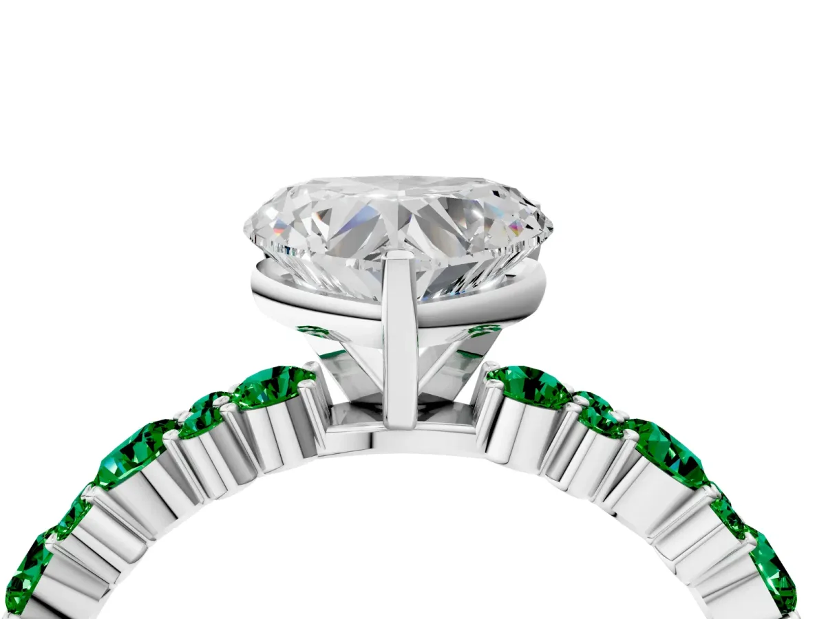 Heart Cut Diamond Side Stone Solitaire Ring with Round Emerald and Four-Prong Setting Platinum