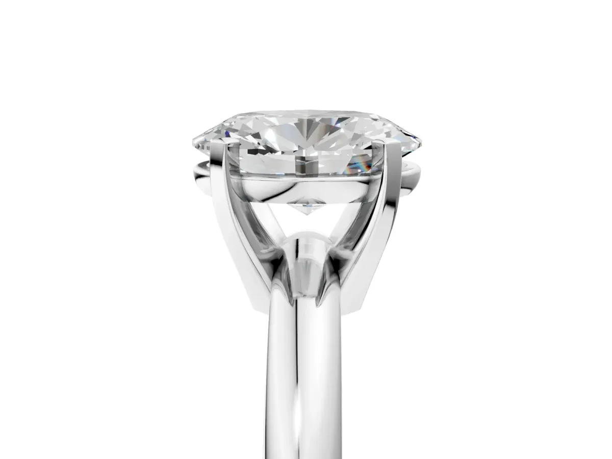 Oval Cut Diamond Solitaire Engagement Ring with Round Band and Four-Prong Setting Silver