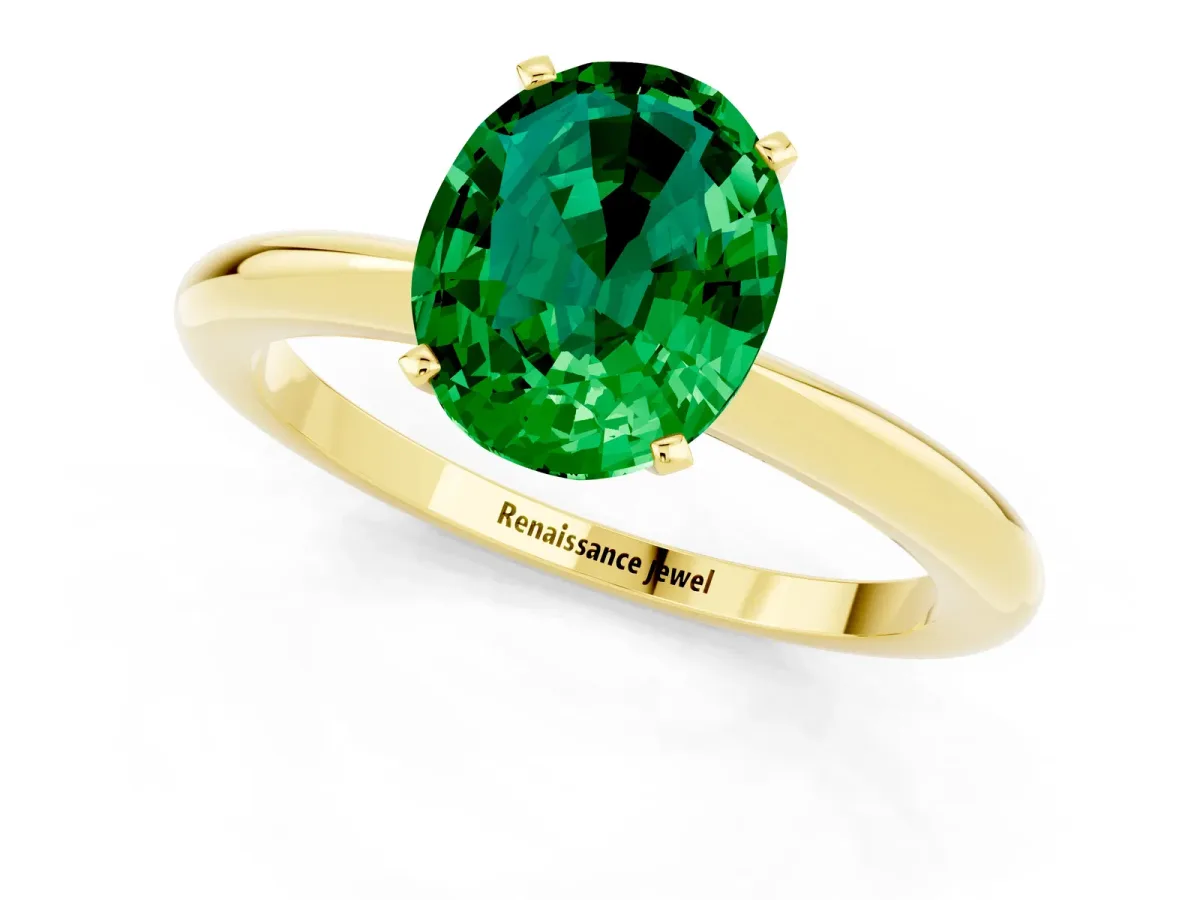 Oval Cut Emerald Solitaire Ring with Six-Prong Setting and Classic Band Yellow gold