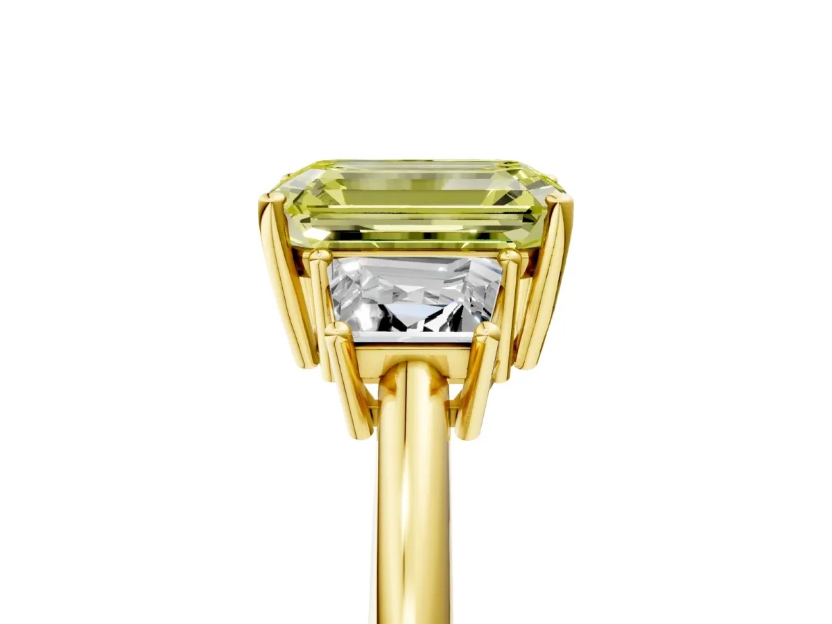 Fancy Yellow Emerald Cut Diamond Three-Stone Ring with Trapezoid Side Stones and Prong Setting Yellow gold