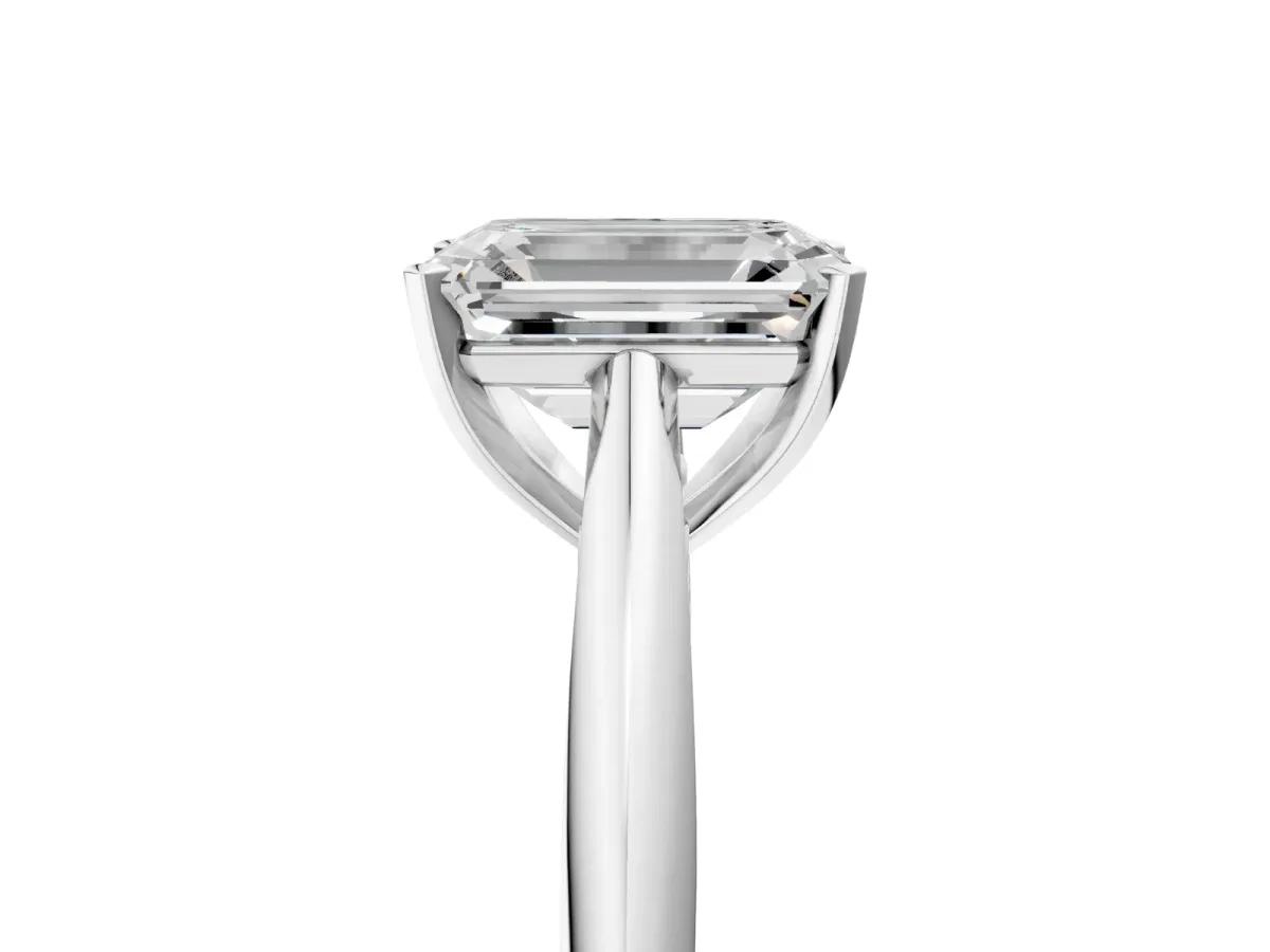 Emerald Cut Diamond Solitaire Engagement Ring with Cathedral Setting and Four-Prong Mount White gold