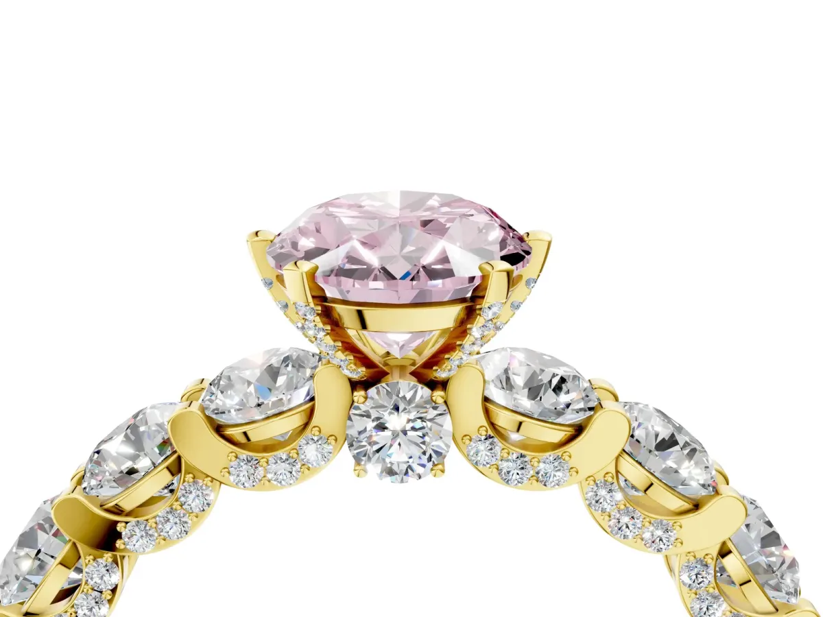 Fancy Pink Oval Cut Diamond Side Stone Engagement Ring with Four-Prong Setting Yellow gold