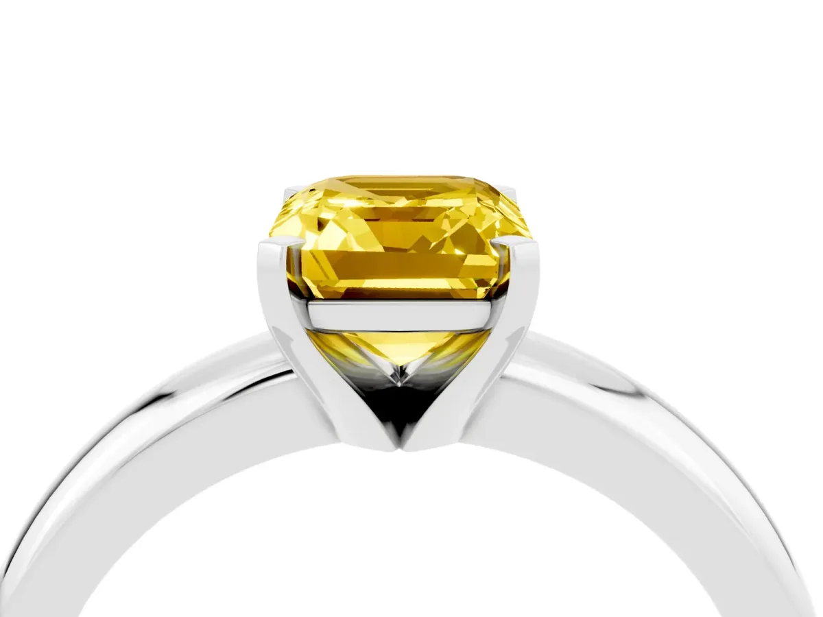 Emerald Cut Yellow Sapphire Solitaire Engagement Ring with Round Band and Four-Prong Setting Silver