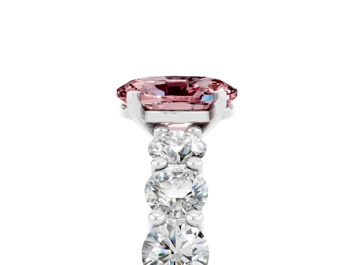 Oval Cut Morganite Prong Setting with Side Stones on a Pave Band Silver