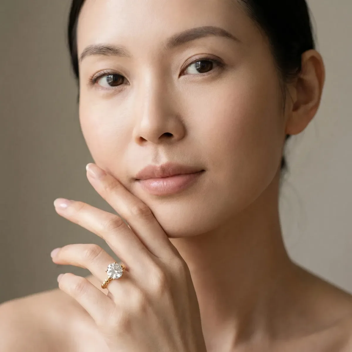 Round Cut Diamond Solitaire Ring with Beaded Band and Prong Setting Yellow gold