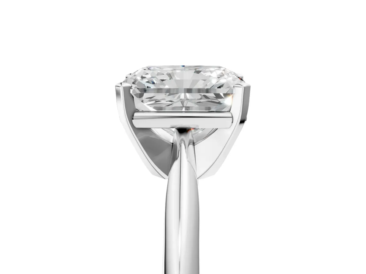 Radiant Cut Cut Solitaire Ring with Four-Prong Setting on a Classic Band Platinum