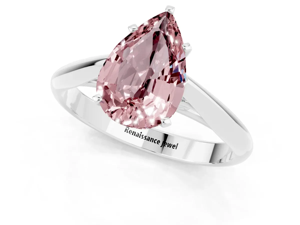 Pear Cut Morganite Solitaire Engagement Ring with Cathedral Setting and Four-Prong Mount White gold