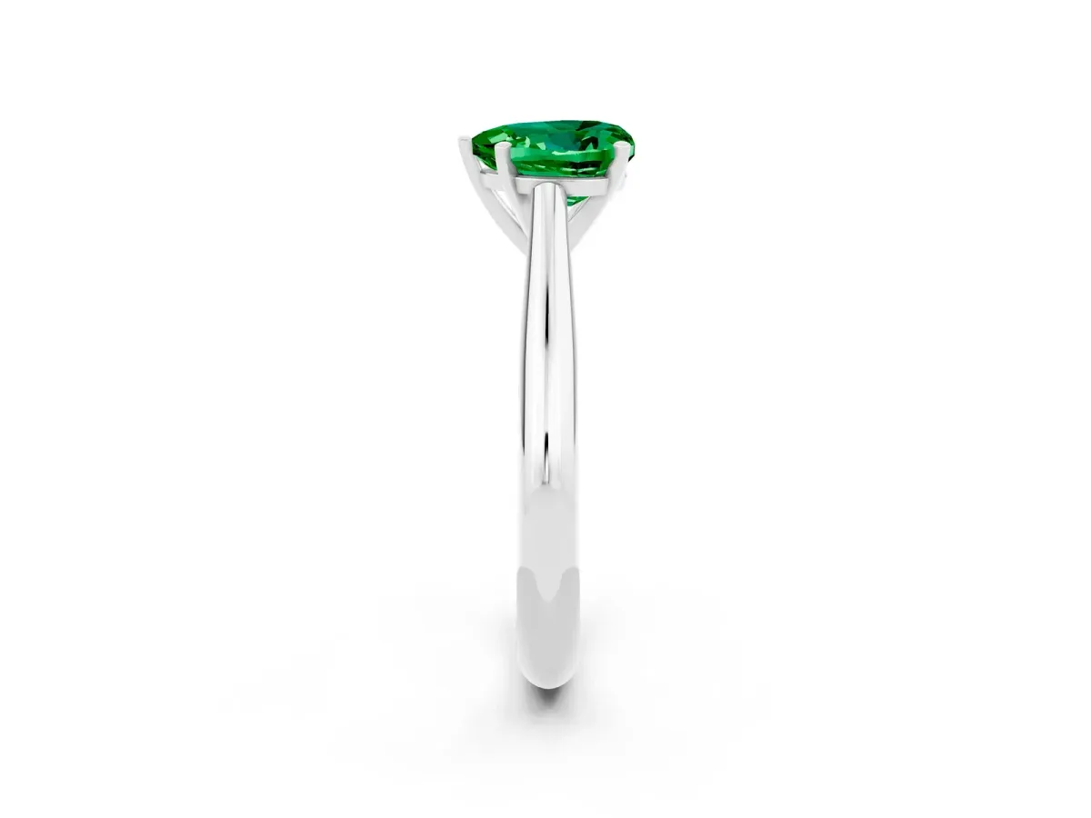 Heart Cut Emerald Solitaire Engagement Ring with Cathedral Setting and Four-Prong Mount White gold