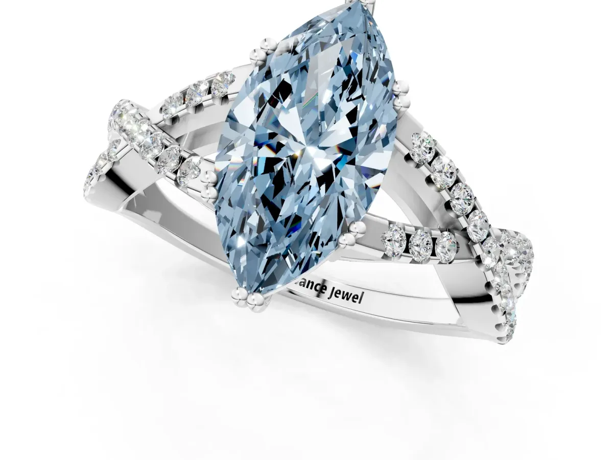 Fancy Blue Marquise Cut Diamond Solitaire Ring with Four-Prong Setting and Twisted Pavé Band Silver