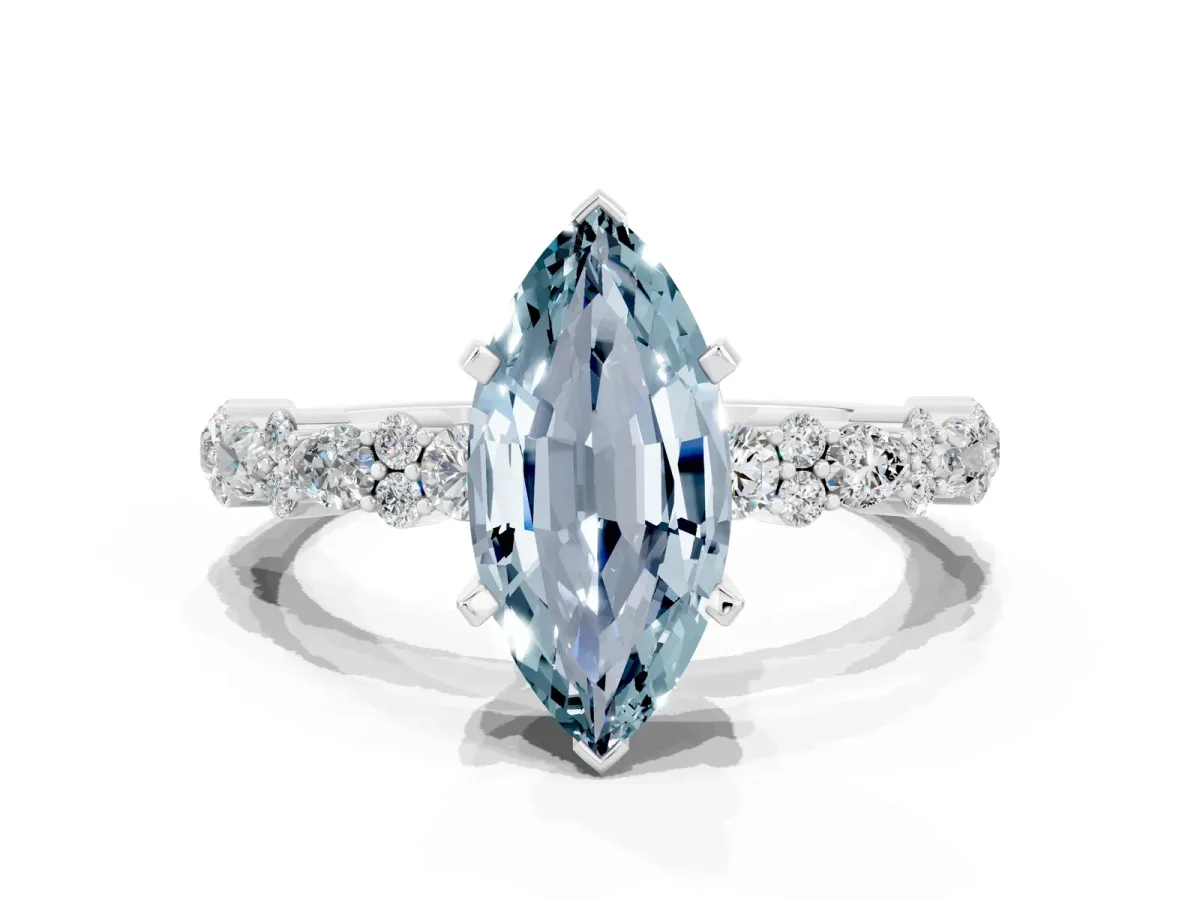 Marquise Cut Aquamarine Side Stone Solitaire Ring with Round and Four-Prong Setting Silver