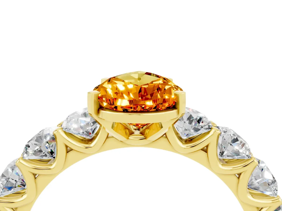Pear Cut Citrine Prong Setting with Side Stones on a Pave Band Yellow gold