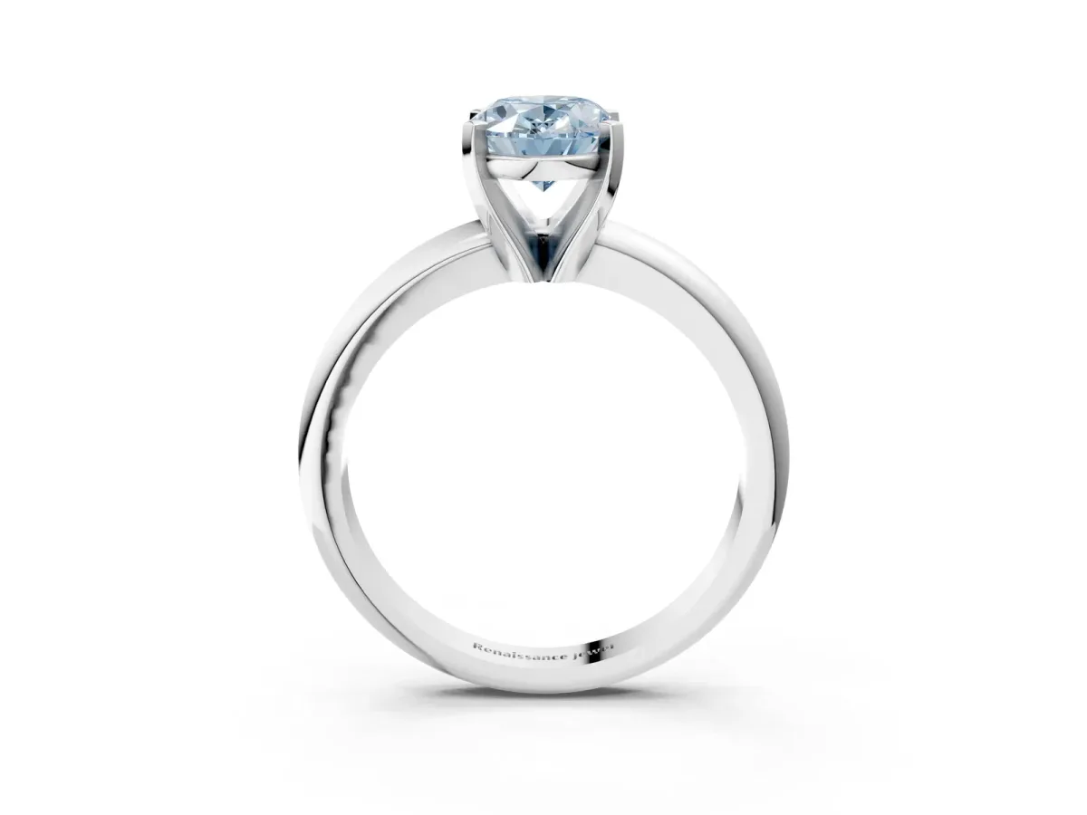 Fancy Blue Oval Cut Diamond Solitaire Engagement Ring with Round Band and Four-Prong Setting Silver