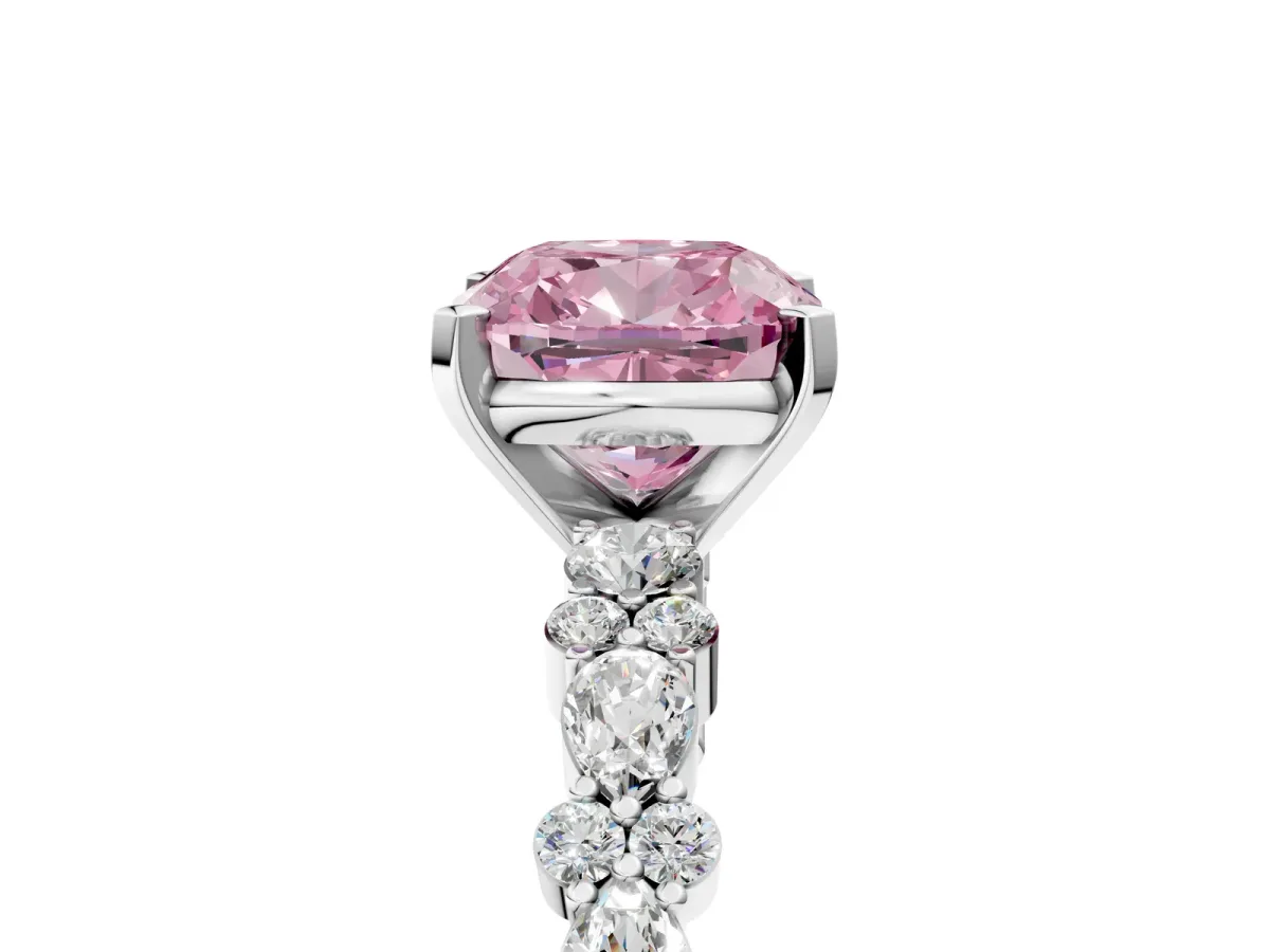 Fancy Pink Cushion Cut Diamond Side Stone Solitaire Ring with Round and Four-Prong Setting Platinum