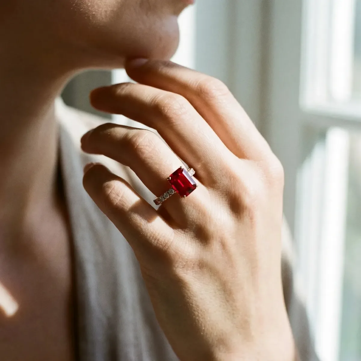 Emerald Cut Ruby Solitaire Ring with Round Pavé Band and Four-Prong Setting Rose gold