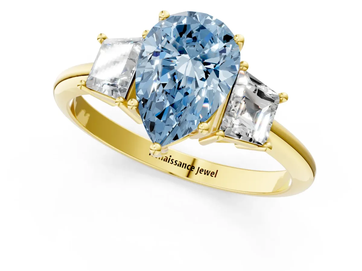 Fancy Blue Pear Cut Diamond Three-Stone Ring with Trapezoid Side Stones and Prong Setting Yellow gold