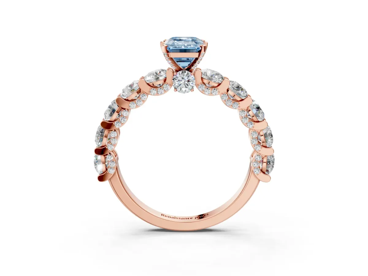 Fancy Blue Emerald Cut Diamond Side Stone Engagement Ring with Four-Prong Setting Rose gold