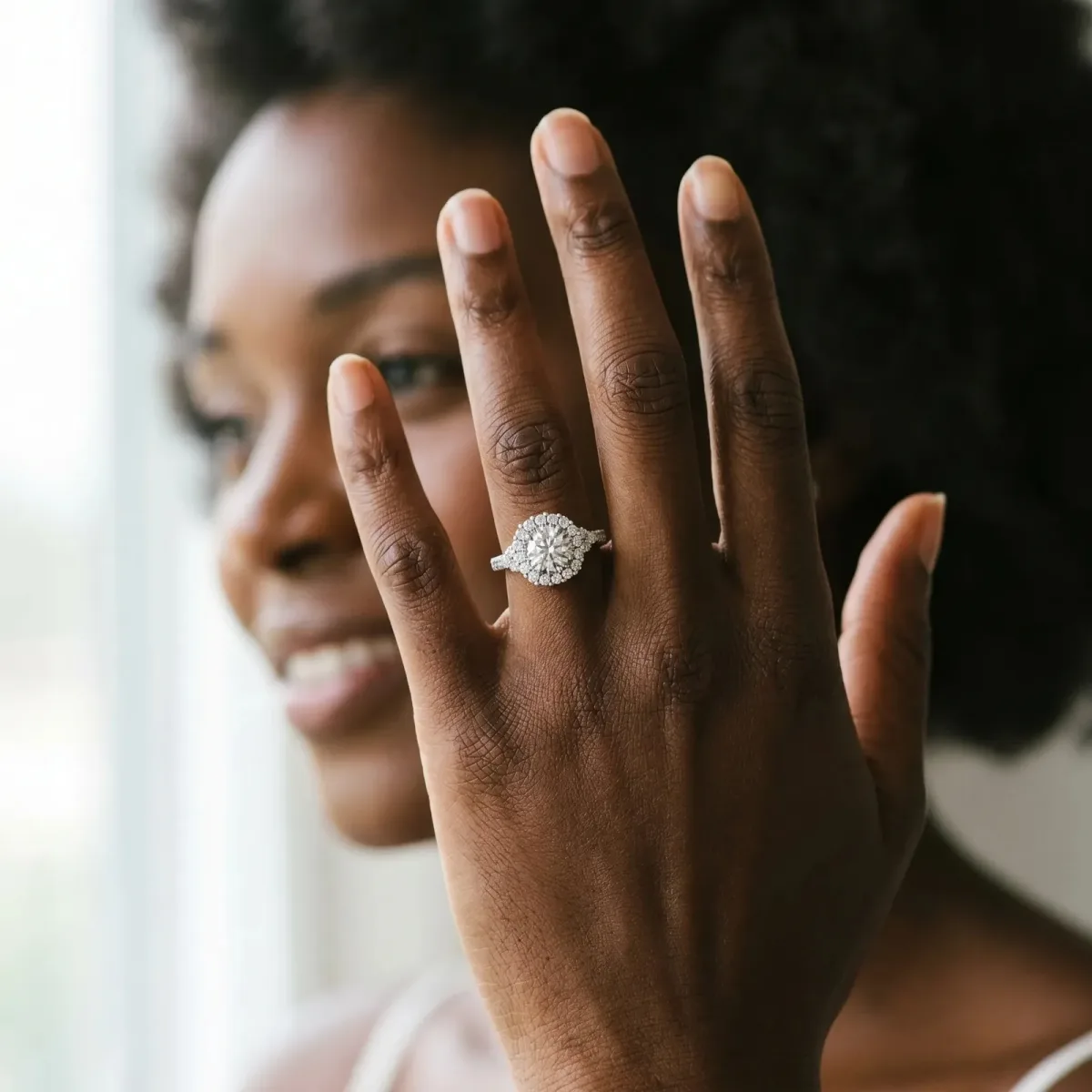 Round Cut Diamond Halo Ring with Pavé Band and Four-Prong Setting Silver