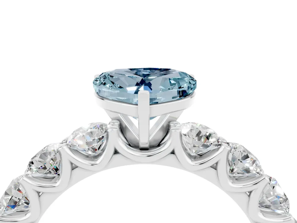 Heart Cut Aquamarine Prong Setting with Side Stones on a Pave Band Silver