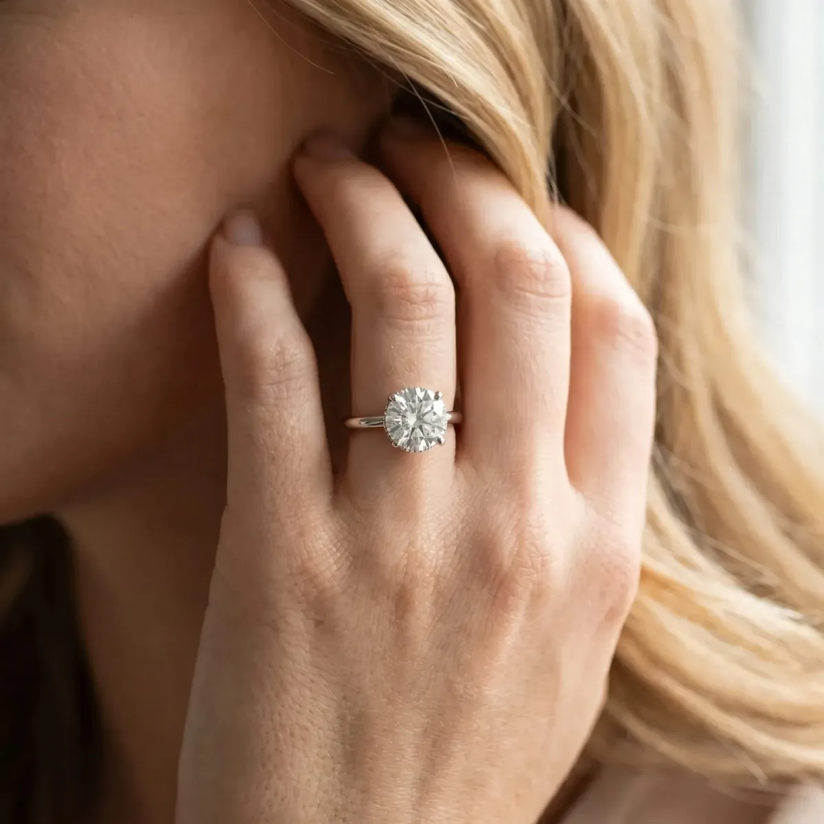 Round Cut Diamond Solitaire Ring with Classic Band and Four-Prong Setting Silver